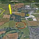 Aerial view of the area, showing the Durrington Walls, in red, and the surrounding circular structure, as indicated by yellow dots.
